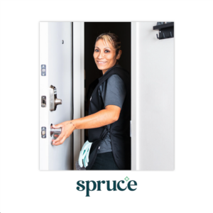 Spruce Cleaner entering through apartment door.