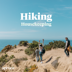 Three friends hiking on a mountain with blue sky overhead. The word 'hiking' is above the word 'housekeeping' which is crossed out. There is a white Spruce logo in the bottom left corner.